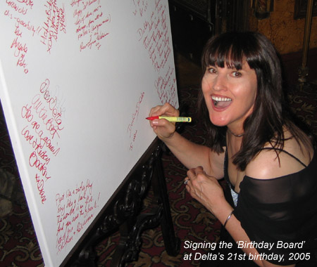 Signing the Message Board for Delta at Delta's 21st birthday party